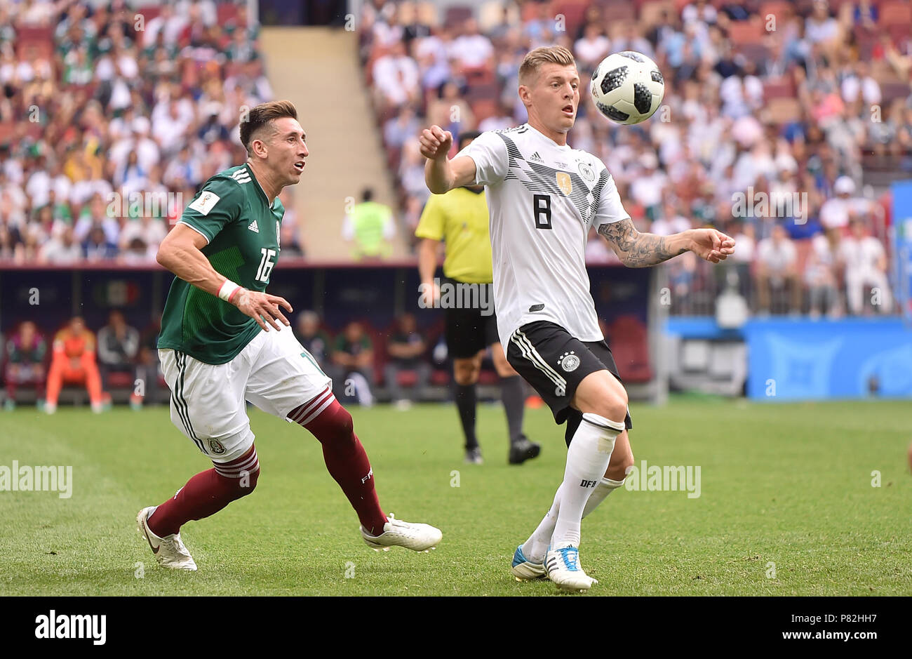 MOSCOW, RUSSIA - JUNE 17: Hector Herrera of Mexico competes with Toni Kroos of Germany during the 2018 FIFA World Cup Russia group F match between Germany and Mexico at Luzhniki Stadium on June 17, 2018 in Moscow, Russia. (Photo by Lukasz Laskowski/PressFocus/MB Media) Stock Photo