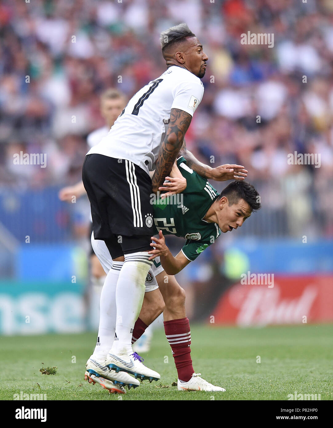 MOSCOW, RUSSIA - JUNE 17: Jerome Boateng of Germany competes with Hirving Lozano of Mexico during the 2018 FIFA World Cup Russia group F match between Germany and Mexico at Luzhniki Stadium on June 17, 2018 in Moscow, Russia. (Photo by Lukasz Laskowski/PressFocus/MB Media) Stock Photo