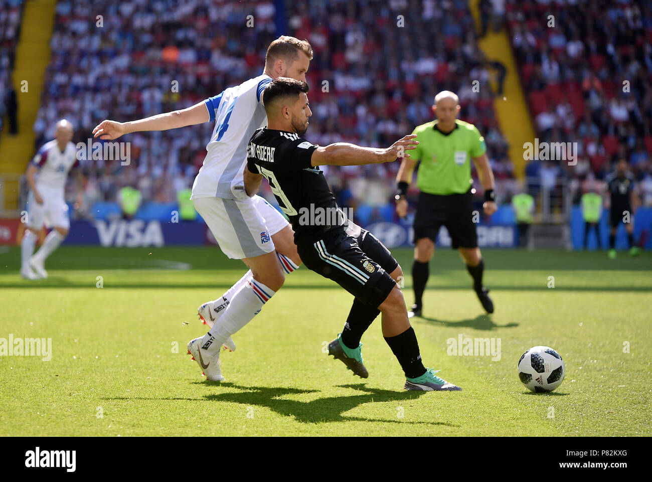 MOSCOW, RUSSIA - JUNE 16: Kari Arnason of Iceland competes with Sergio Aguero of Argentina during the 2018 FIFA World Cup Russia group D match between Argentina and Iceland at Spartak Stadium on June 16, 2018 in Moscow, Russia. (Photo by Lukasz Laskowski/PressFocus/MB Media) Stock Photo