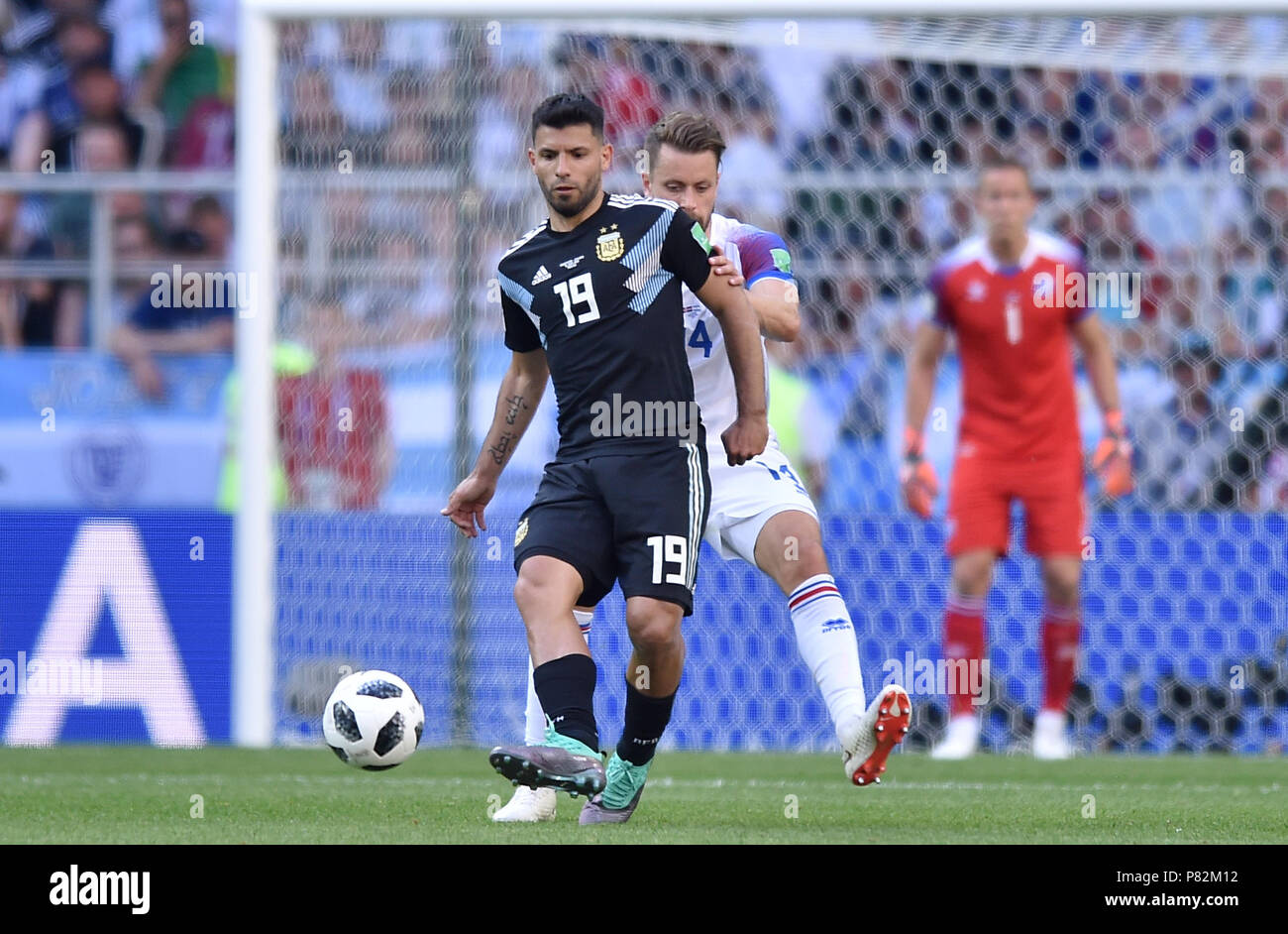MOSCOW, RUSSIA - JUNE 16: Kari Arnason of Iceland competes with Sergio Aguero of Argentina during the 2018 FIFA World Cup Russia group D match between Argentina and Iceland at Spartak Stadium on June 16, 2018 in Moscow, Russia. (Photo by Lukasz Laskowski/PressFocus/MB Media) Stock Photo