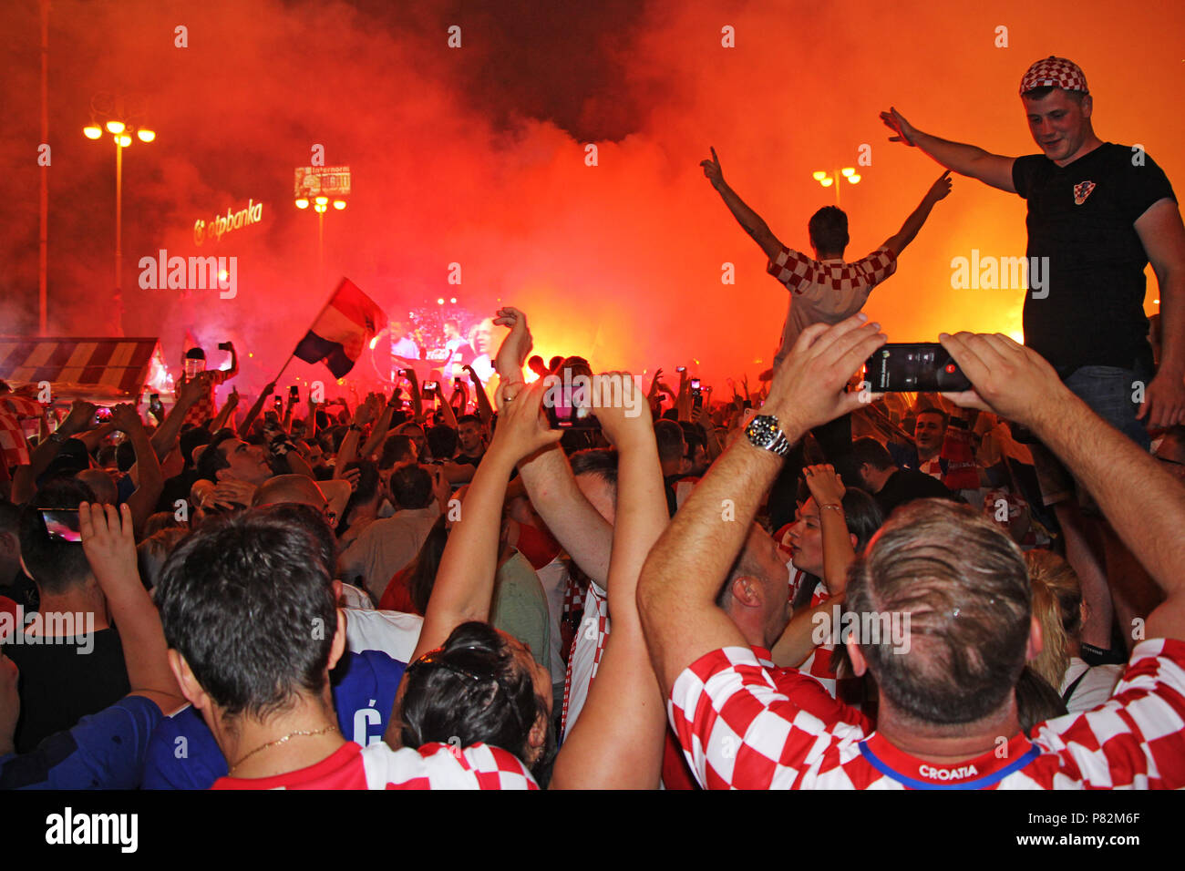 ZAGREB, CROATIA - JULY 07 Croatian football fans on the Ban Jelacic Square, watching 2018 FIFA WORLD CUP RUSSIA match Russia vs Croatia on July 07, 20 Stock Photo