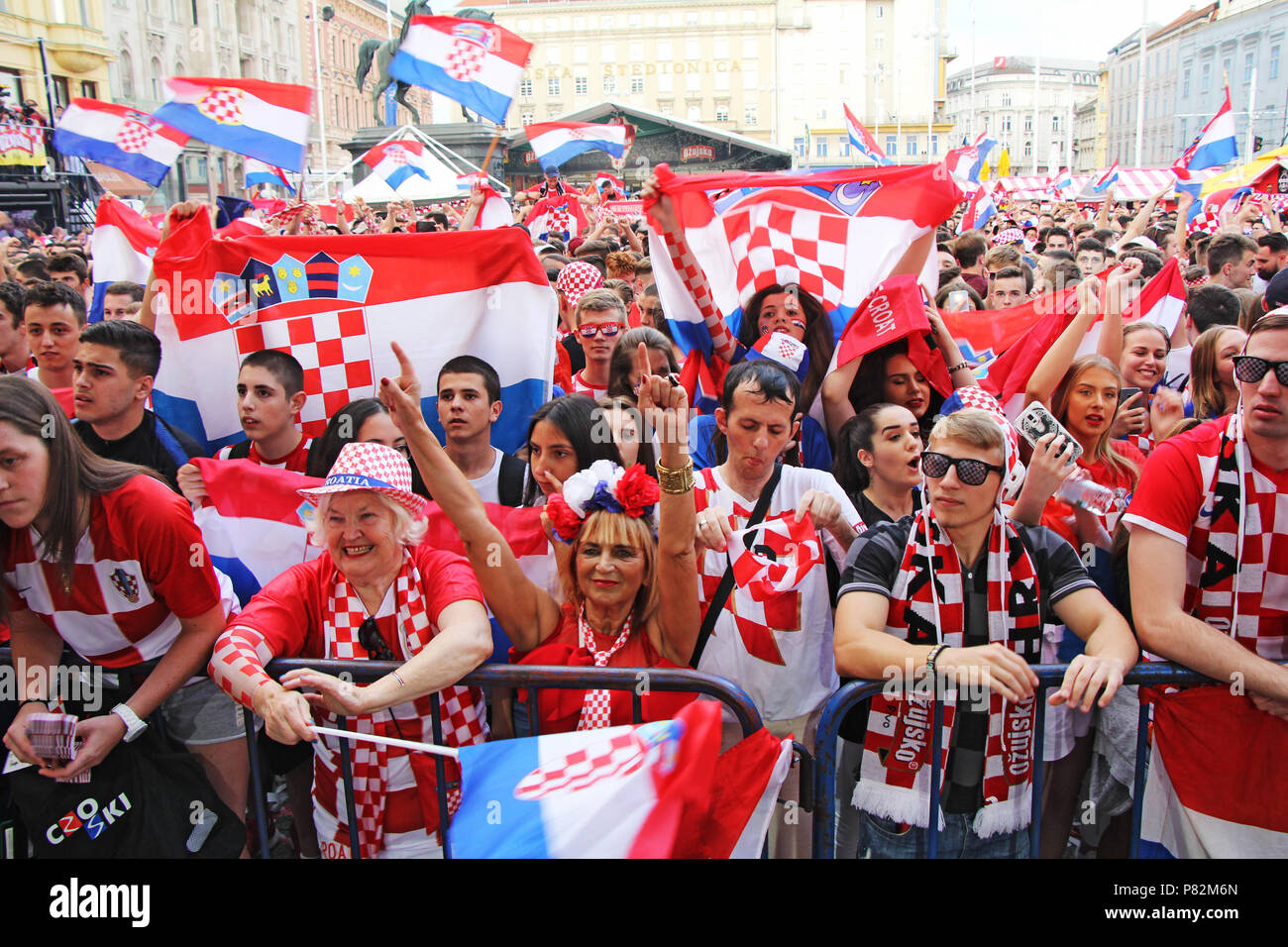 ZAGREB, CROATIA - JULY 07 Croatian football fans on the Ban Jelacic Square, watching 2018 FIFA WORLD CUP RUSSIA match Russia vs Croatia on July 07, 20 Stock Photo