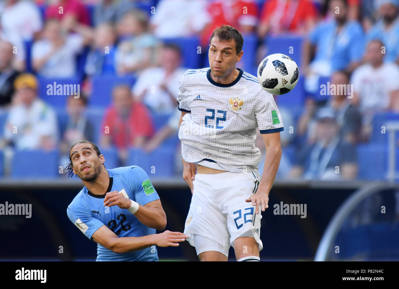 SAMARA, RUSSIA - JUNE 25: Martin Caceres of Uruguay competes with Artem Dzyuba of Russia during the 2018 FIFA World Cup Russia group A match between Uruguay and Russia at Samara Arena on June 25, 2018 in Samara, Russia. (Photo by Lukasz Laskowski/PressFocus/MB Media) Stock Photo