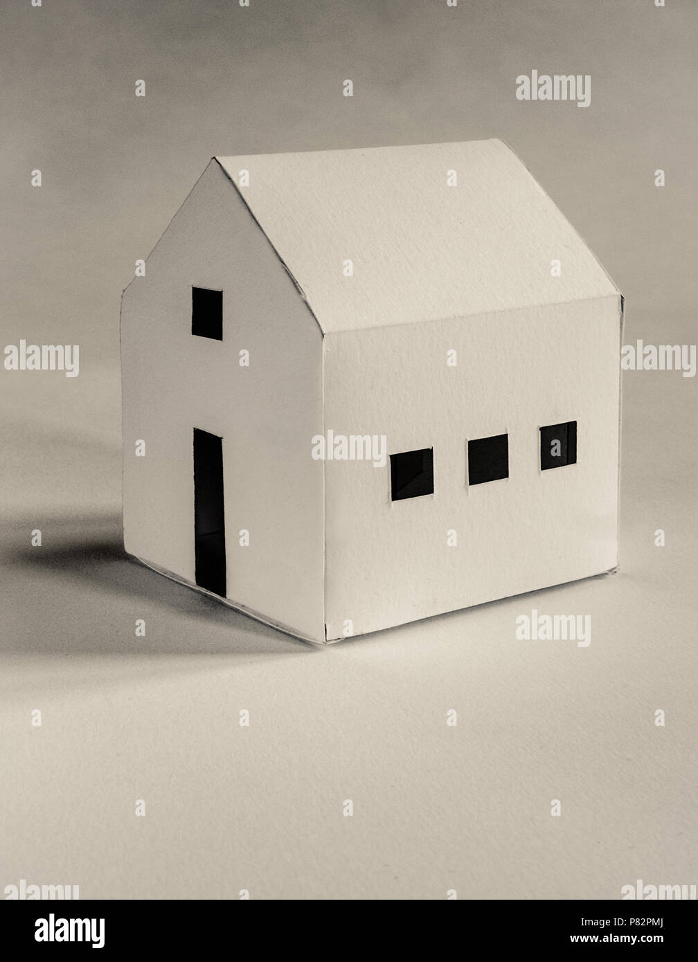white cardboard hand made paper work house Stock Photo