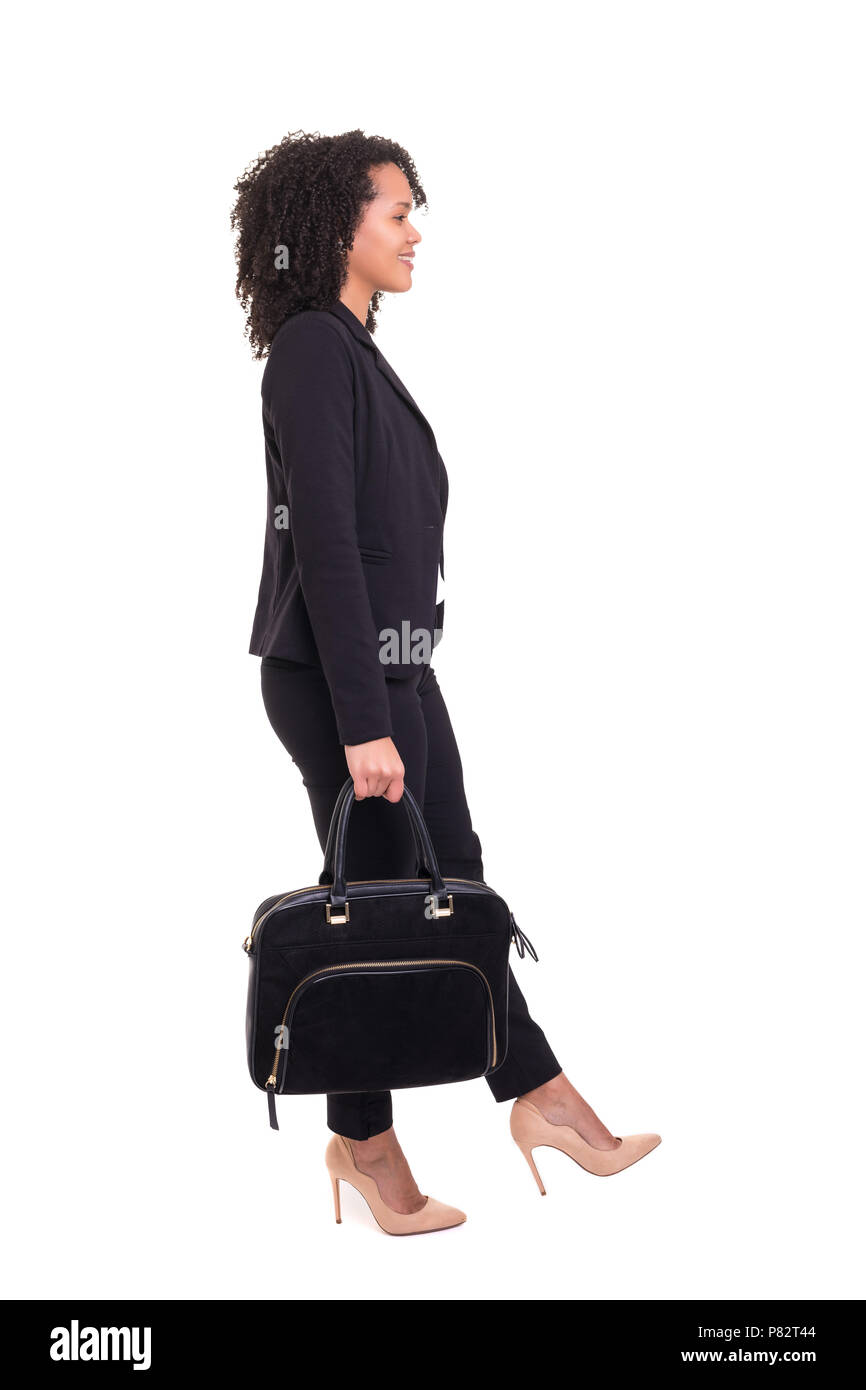Beautiful african business woman posing isolated over white background ...