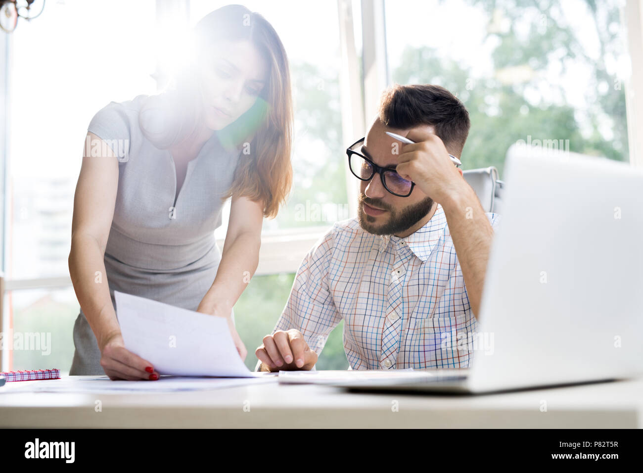 Collaborating in modern office two hi-res stock photography and images ...