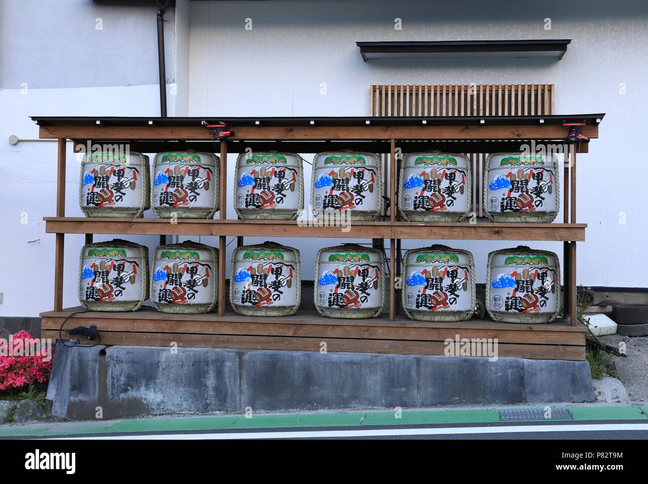 Shelf of Japanese wine (sake) barrels at a shrine near Kawaguchiko