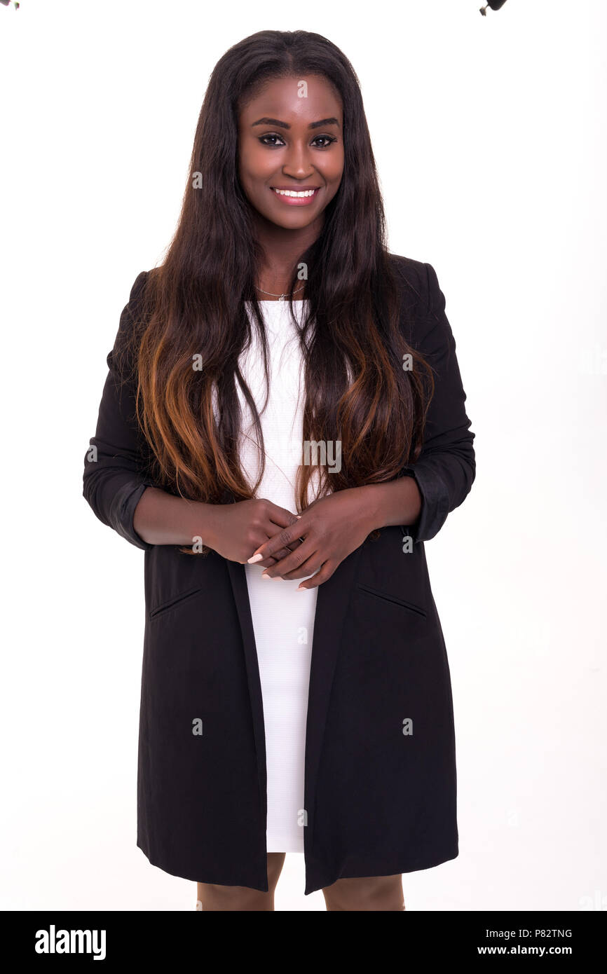 Beautiful african business woman posing isolated over white background ...