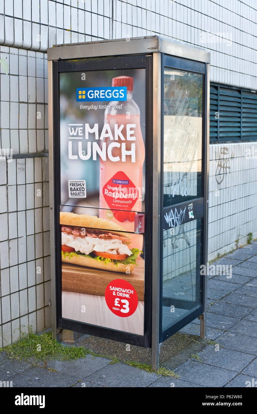 Phonebox billboard site advertising Greggs lunch for £3 in Plymouth Devon England UK Stock Photo