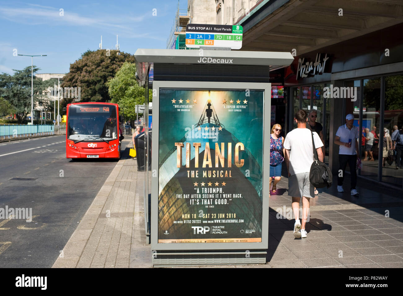 JCDecaux roadside bus stop billboard site advertising Titanic the musical in Plymouth Devon England UK Stock Photo