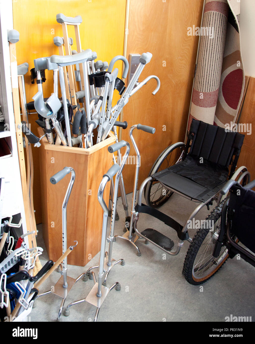 Wheelchair and crutches for mobility hires stock photography and