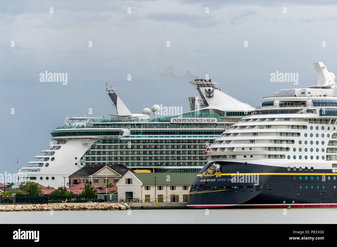 Falmouth, Jamaica - June 03 2015: Disney Fantasy and Royal Caribbean Independence of the Seas cruise ships docked side by side at the Falmouth Cruise Stock Photo