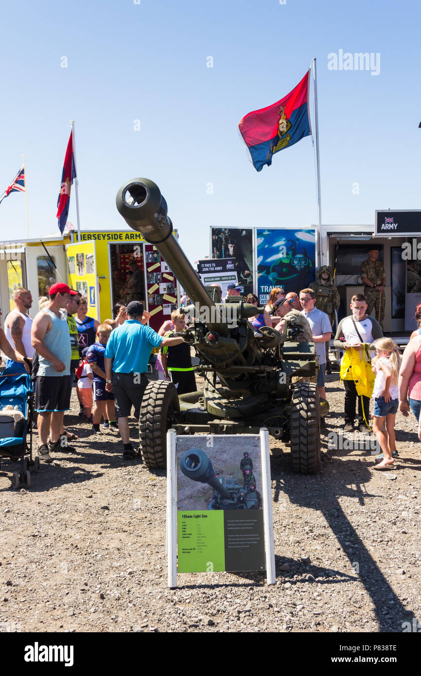 Southport, Lancashire. 8th July 2018. Sunday at the Southport Airshow 2018. The British armed forces recruitment and public relations stands attracted the interest of visitors to the Southport Airshow 2018, including the army showing their 105mm light gun. Stock Photo