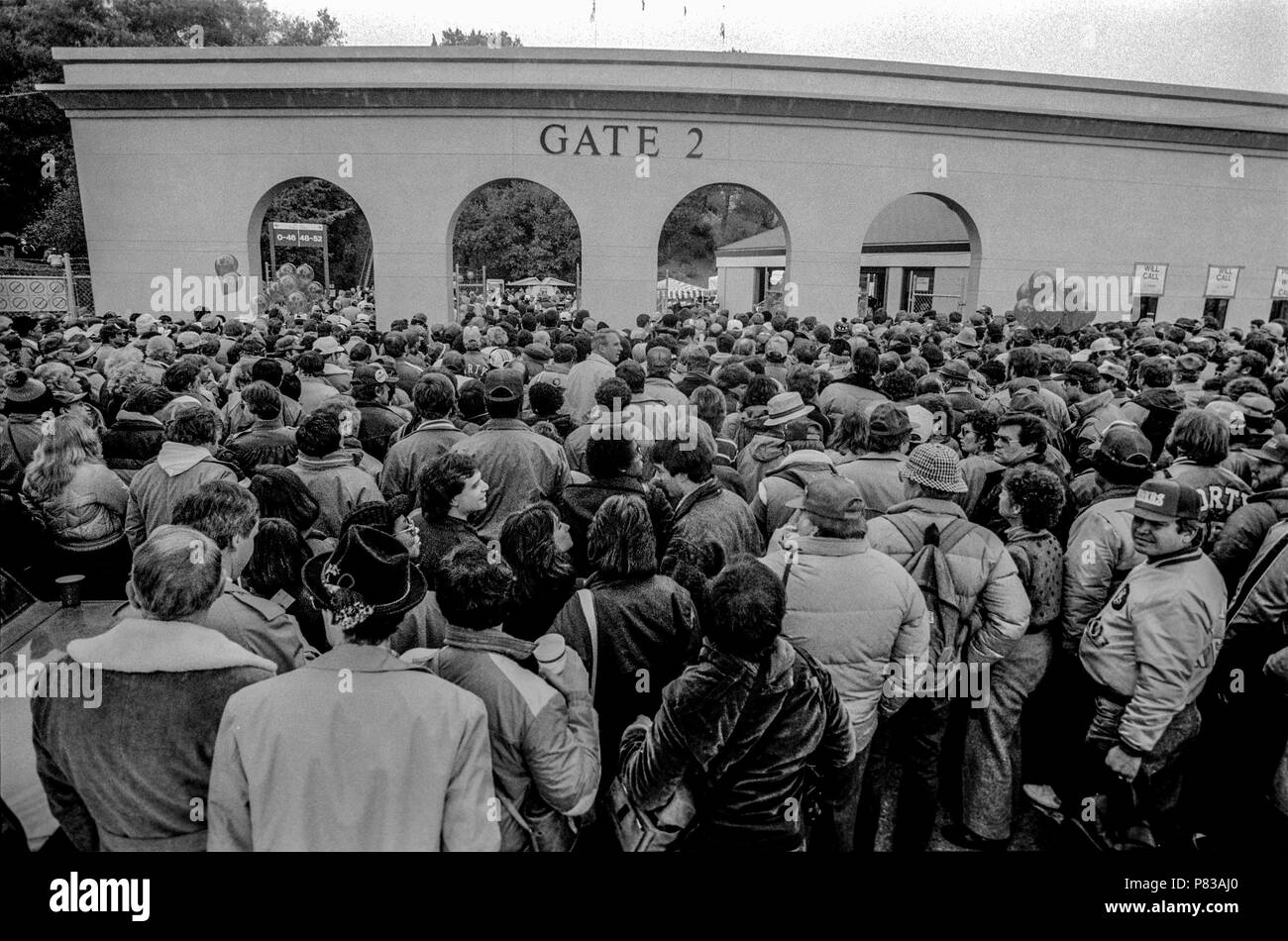 Stanford, California, USA. 20th Jan, 1985. Crowd files through gate 2 on the way into the stadium after leaving the Super Bowl XIX tailgate on the Stanford University campus. The San Francisco 49ers defeated the Miami Dolphins 38-16 on Sunday, January 20, 1985. Credit: Al Golub/ZUMA Wire/Alamy Live News Stock Photo