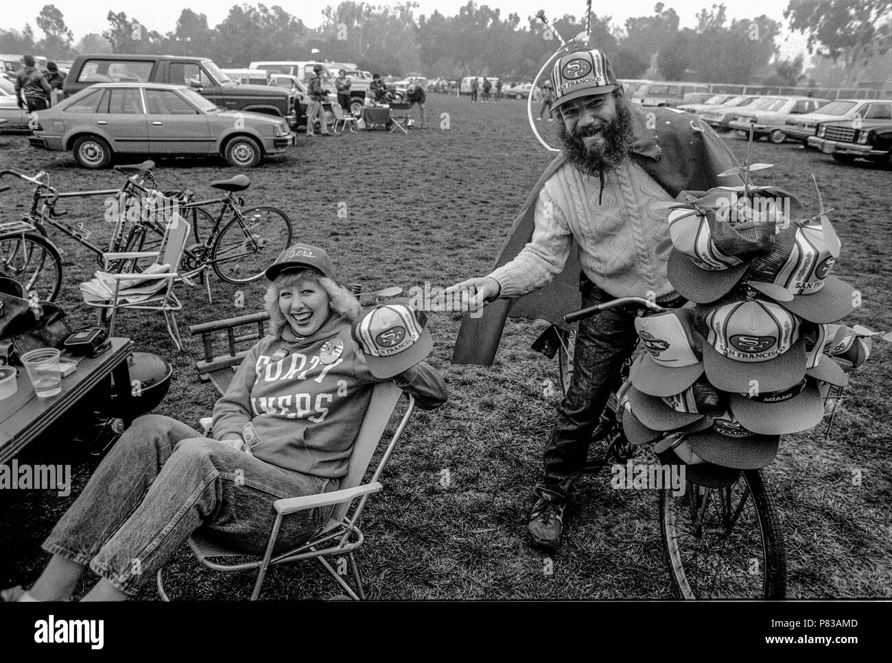 Stanford, California, USA. 20th Jan, 1985. Banjoman, Stacy Samuels, sells propeller hats at the Super Bowl XIX tailgate on the Stanford University campus. The San Francisco 49ers defeated the Miami Dolphins 38-16 on Sunday, January 20, 1985. Credit: Al Golub/ZUMA Wire/Alamy Live News Stock Photo