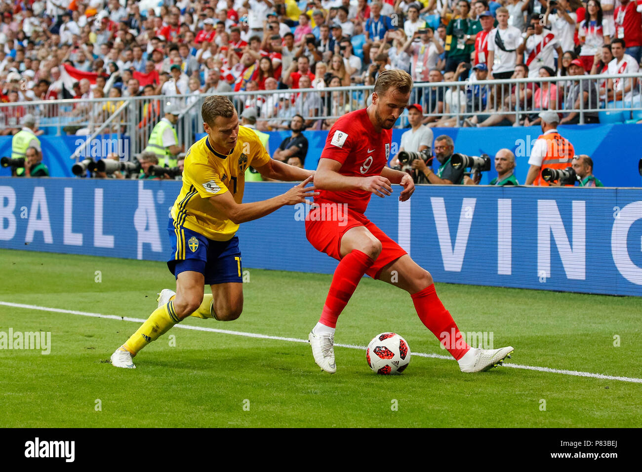 Samara, Russia. 7th July, 2018. Viktor Claesson of Sweden and Harry Kane of England during the 2018 FIFA World Cup Quarter Final match between Sweden and England at Samara Arena on July 7th 2018 in Samara, Russia. (Photo by Daniel Chesterton/phcimages.com) Credit: PHC Images/Alamy Live News Stock Photo