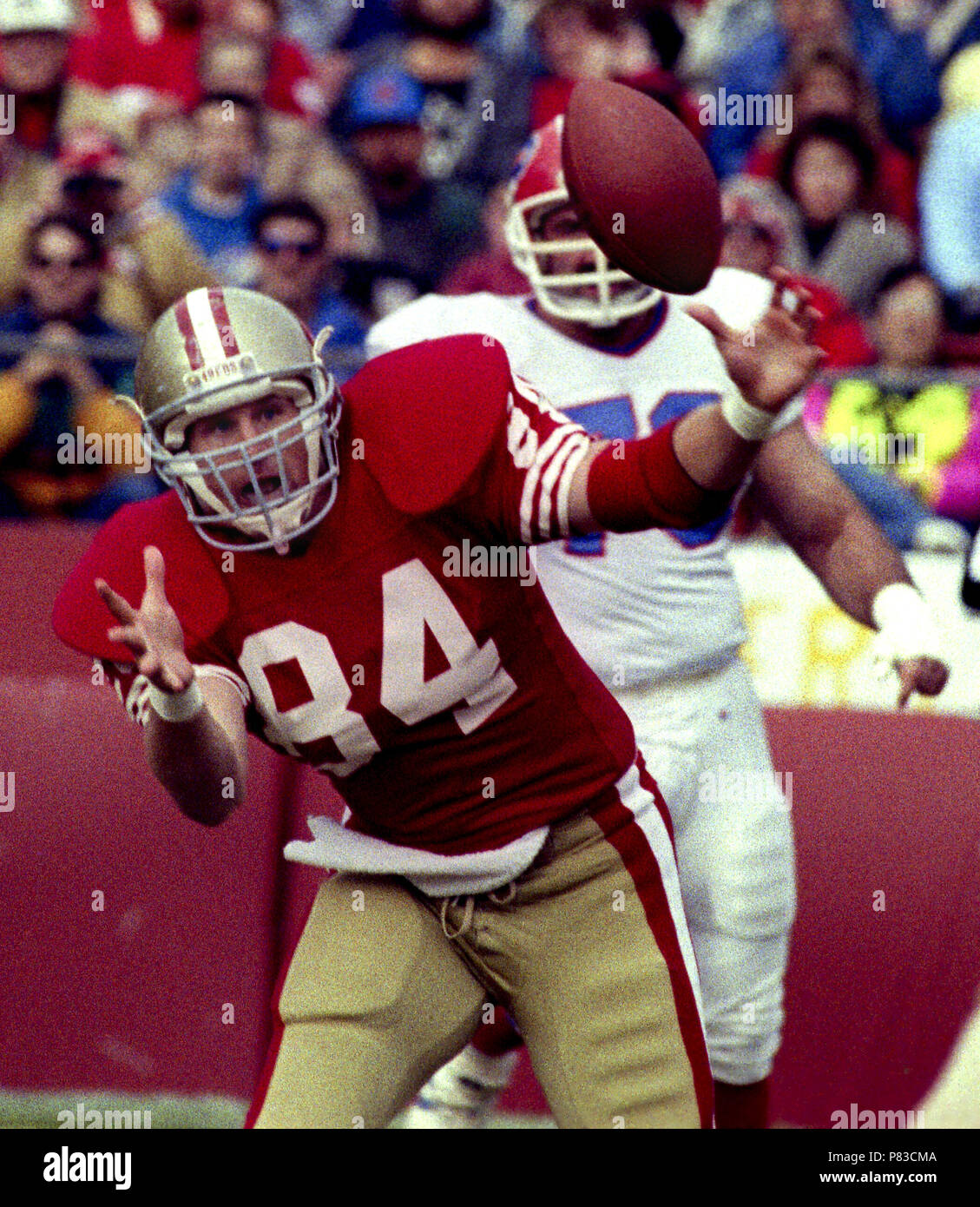 San Francisco, California, USA. 17th Dec, 1989. San Francisco 49ers vs  Buffalo Bills at Candlestick Park Sunday, December 17, 1989. 49ers beat  Bills 21-10. 49er tight end Brent Jones (84) jumps for