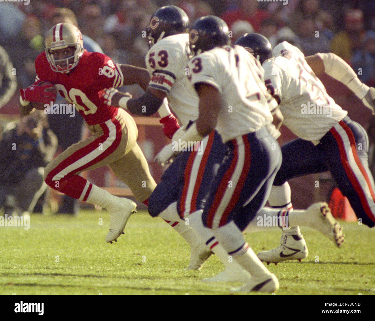 Wide Receiver Jerry Rice #80 of the San Francisco 49ers catches the ball  and moves down field.Circa the 1980's. (Icon Sportswire via AP Images Stock  Photo - Alamy