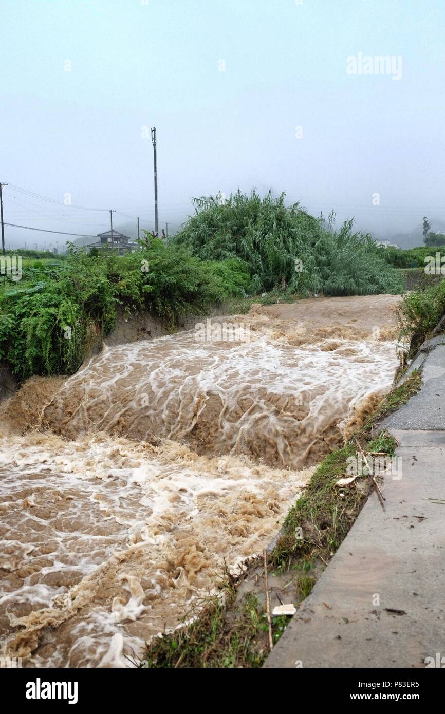 July 7 18 Normally A Trickle This River In Ehime Shikoku Has Become A Raging Muddly Torrent Record Breaking Rainfall Has Caused Flooding And Landslides In Western Japan Damaging Homes And Farmland Credit July 7 18 Normally A Trickle This River In Ehime Shikoku Has Become A Raging Muddly Torrent Record Breaking Rainfall Has Caused Flooding And Landslides In Western Japan Damaging Homes And Farmland Credit