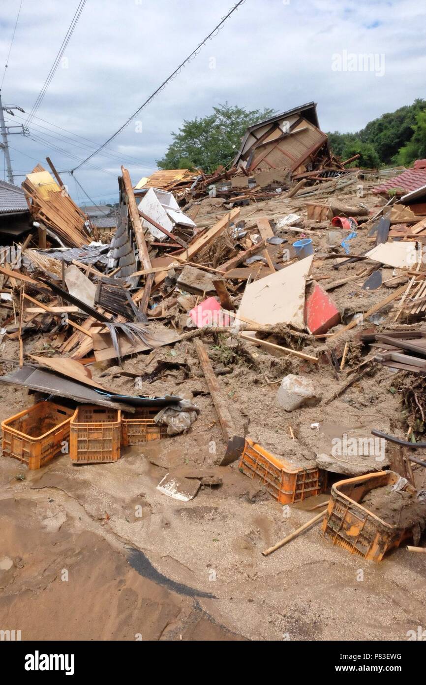 June 8, 2018. A mudslide cuts through a village in Hojo, Ehime, Shikoku, destroying homes and crops. Record rainfall has caused landslides all over western Japan. Credit: Rod Walters/AFLO/Alamy Live News Stock Photo