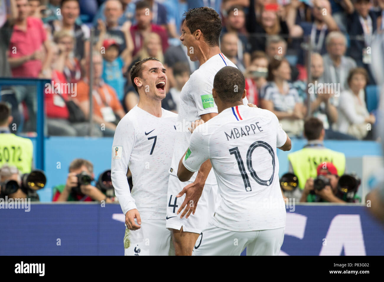 Raphaël Varane and Antoine Griezmann celebrate a goal