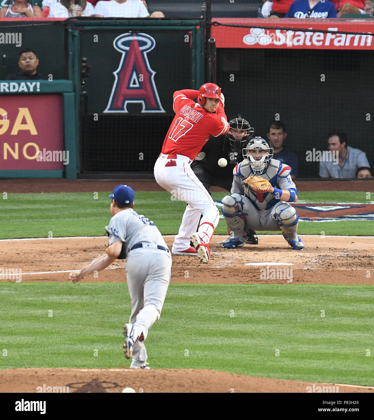 Los Angeles Dodgers starting pitcher Kenta Maeda delivers a pitch to Los  Angeles Angels designated hitter Shohei Ohtani in the second inning during  the Major League Baseball game at Angel Stadium in