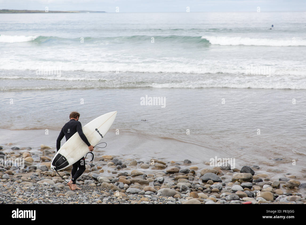 Strandhill, Sligo, Ireland. 8th July 2018: Surfers enjoying the great weather and Atlantic waves surfing in Strandhill in county Sligo - one of the best places in Europe to surf. Stock Photo