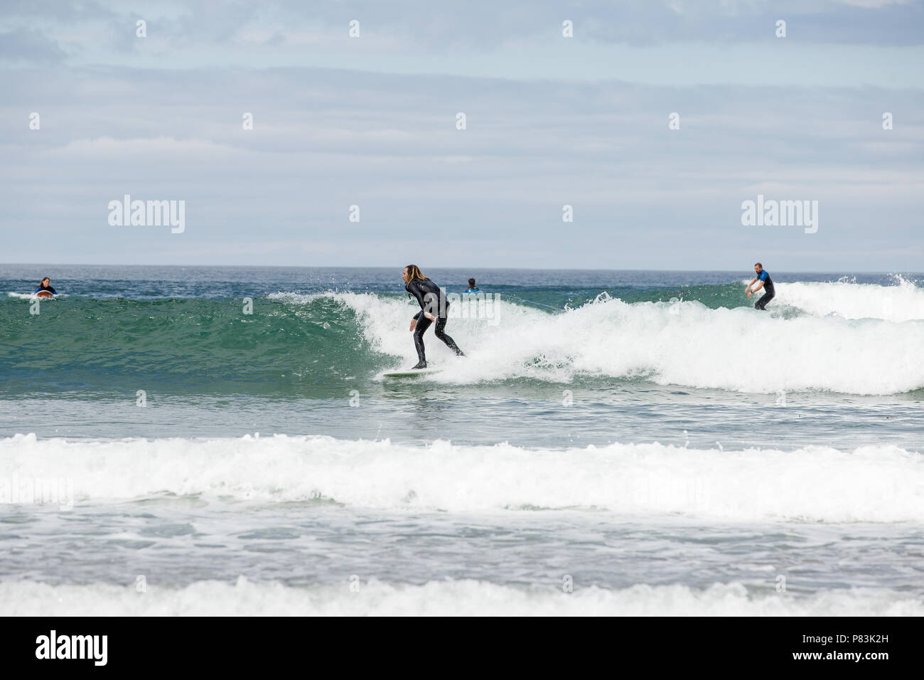 Strandhill, Sligo, Ireland. 8th July 2018: Surfers enjoying the great weather and Atlantic waves surfing in Strandhill in county Sligo - one of the best places in Europe to surf. Stock Photo