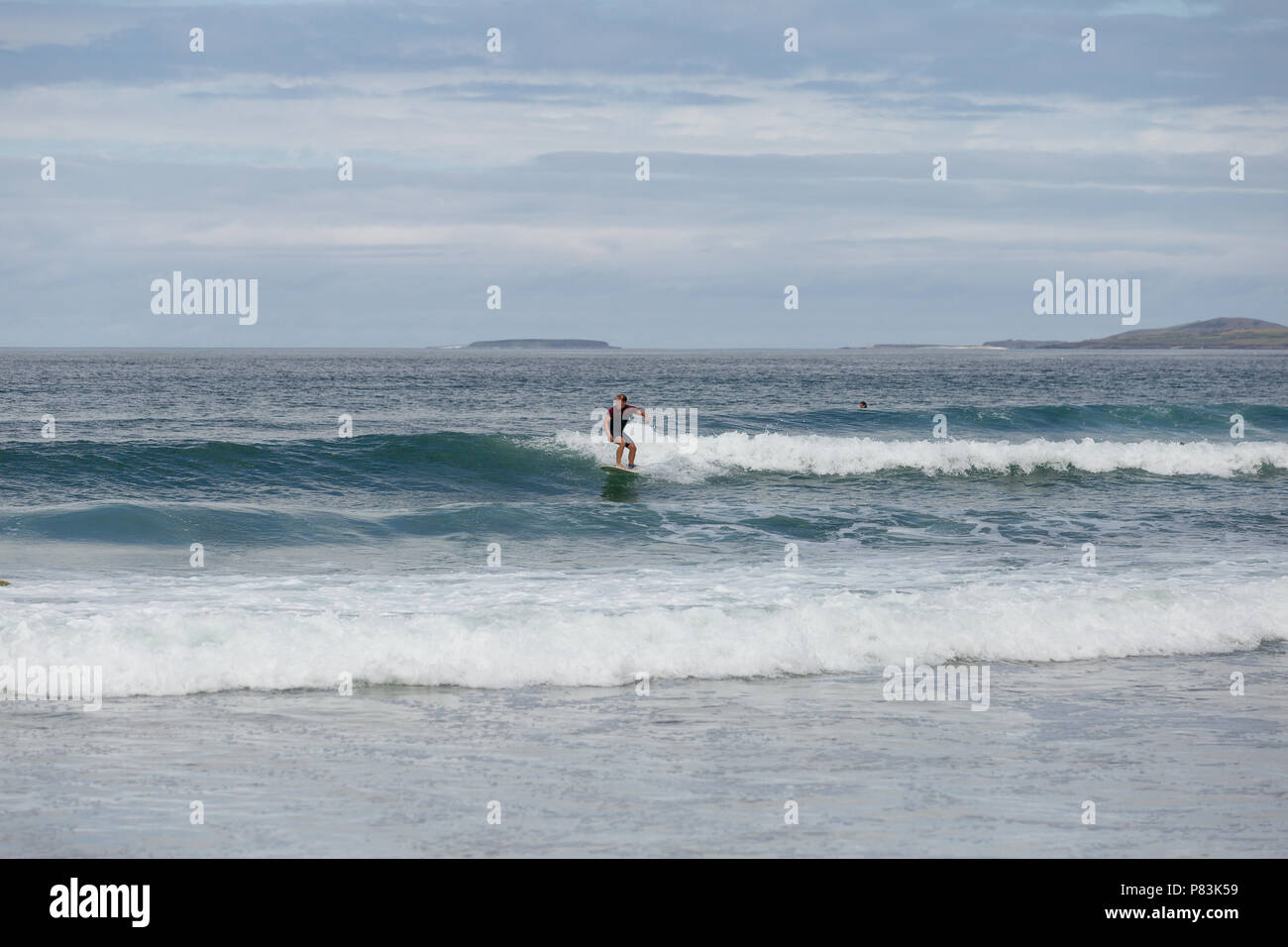 Strandhill, Sligo, Ireland. 8th July, 2018. Surfers enjoying the great weather and Atlantic waves surfing in Strandhill in county Sligo - one of the best places in Europe to surf. Credit: Michael Grubka/Alamy Live News Stock Photo