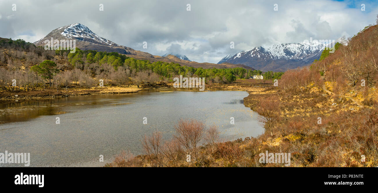Sgùrr Dubh, Liathach, the Beinn Eighe range and Coulin Lodge over Loch Coulin, Torridon, Highland Region, Scotland, UK Stock Photo