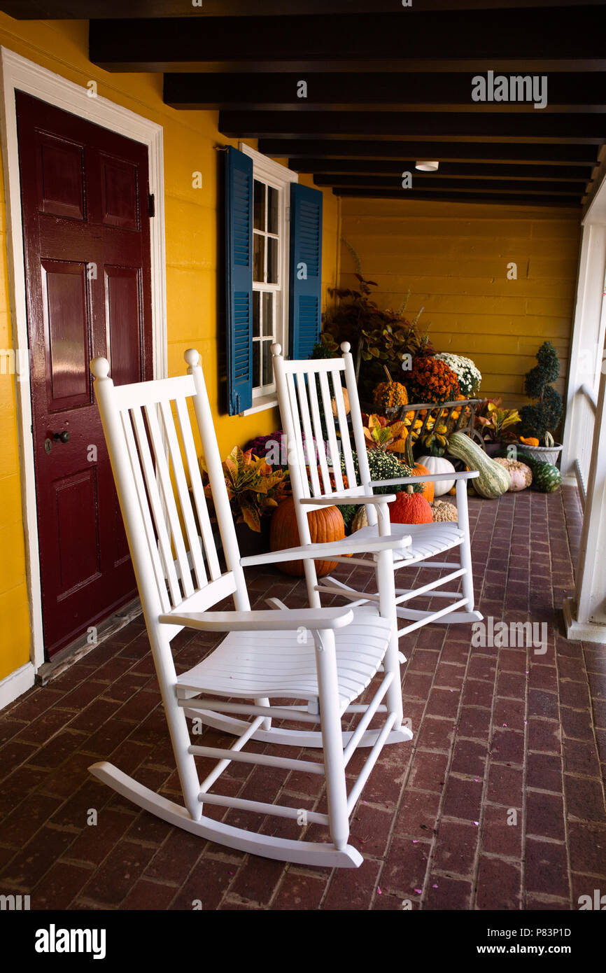 Rocking chairs and pumpkin decoration in the town of Washington, Virginia. Stock Photo