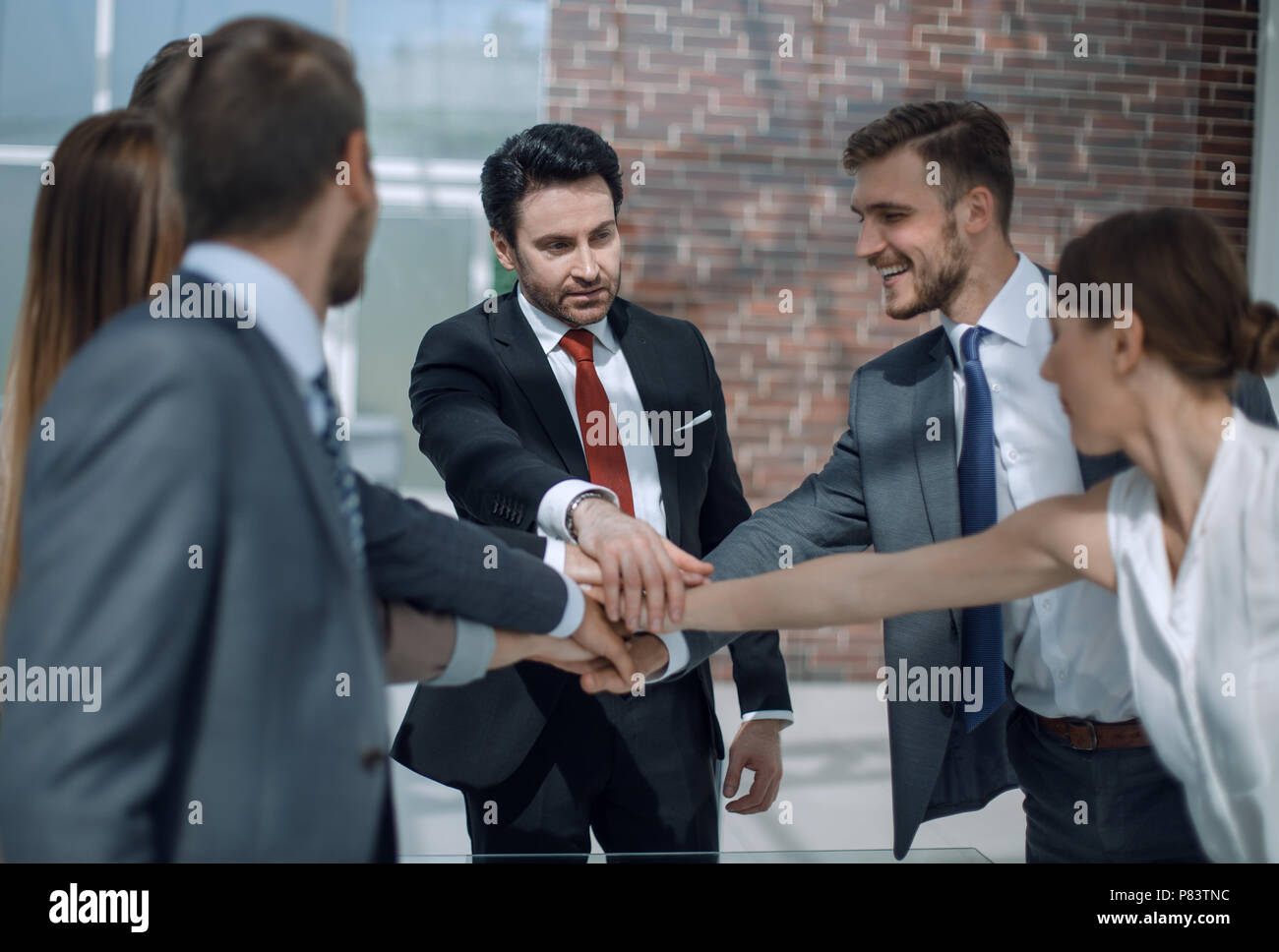 professional business team showing their unity Stock Photo - Alamy