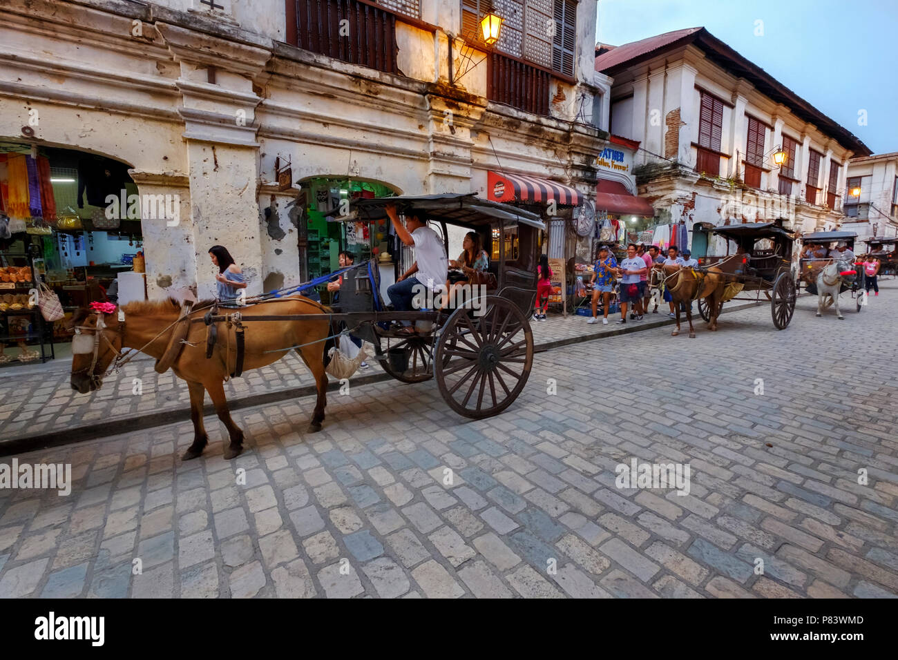 The picturesque 16th century Spanish colonial town of Vigan in the Philippines with its horse-drawn carriages and cobblestone streets Stock Photo