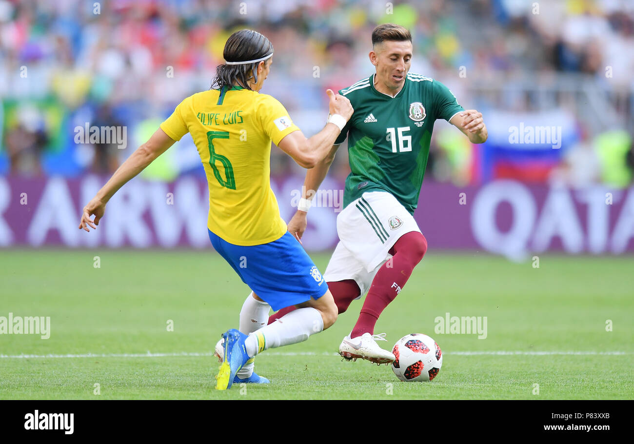 SAMARA, RUSSIA - JULY 02: Filipe Luis of Brazil competes with Hector Herrera of Mexico  during the 2018 FIFA World Cup Russia Round of 16 match between Brazil and Mexico at Samara Arena on July 2, 2018 in Samara, Russia. (Photo by Lukasz Laskowski/PressFocus/MB Media) Stock Photo