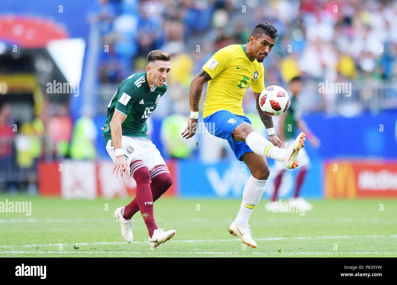 SAMARA, RUSSIA - JULY 02: Hector Herrera of Mexico competes with Paulinho of Brazil during the 2018 FIFA World Cup Russia Round of 16 match between Brazil and Mexico at Samara Arena on July 2, 2018 in Samara, Russia. (Photo by Lukasz Laskowski/PressFocus/MB Media) Stock Photo