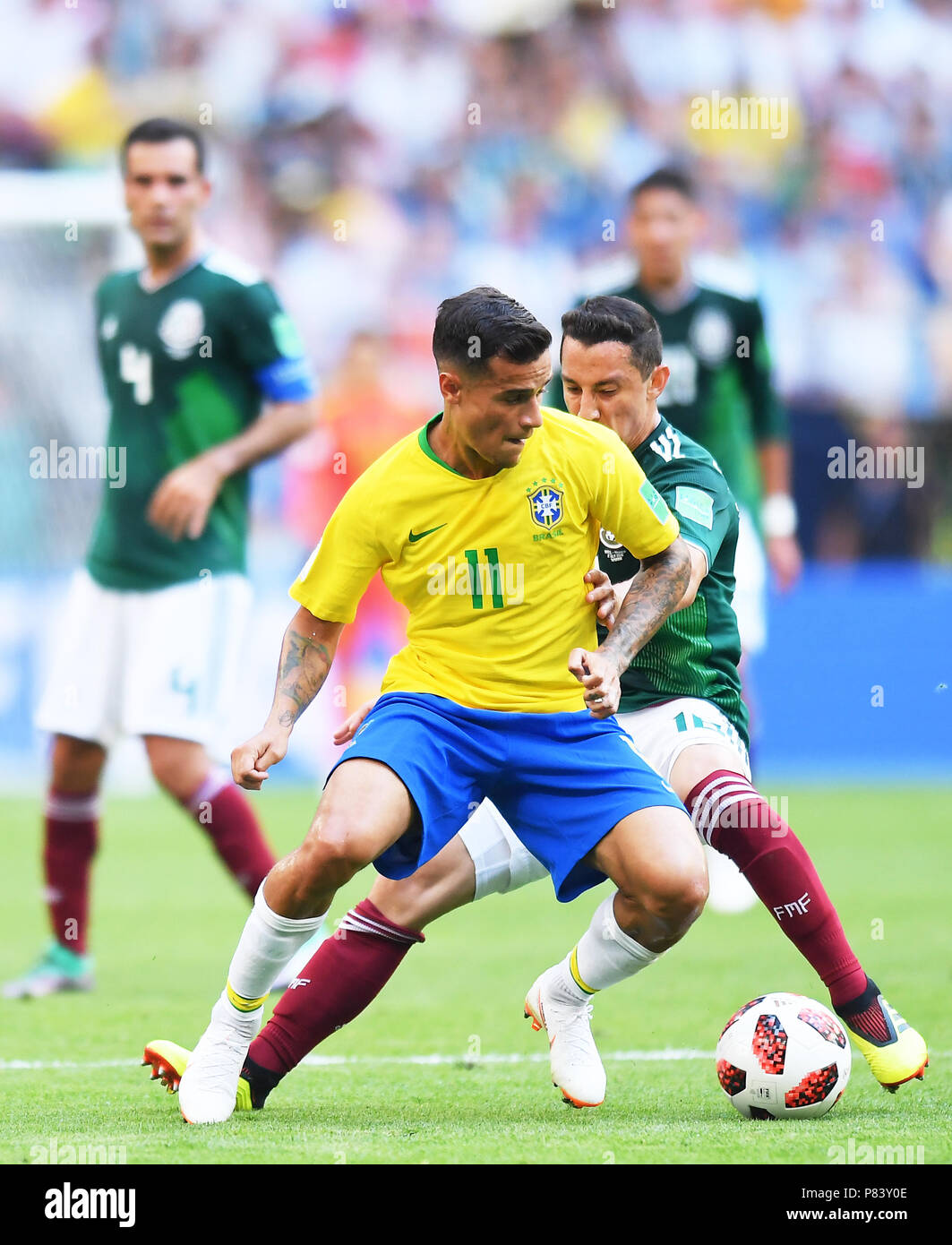 SAMARA, RUSSIA - JULY 02: Philippe Coutinho of Brazil competes with Andres Guardado of Mexico during the 2018 FIFA World Cup Russia Round of 16 match between Brazil and Mexico at Samara Arena on July 2, 2018 in Samara, Russia. (Photo by Lukasz Laskowski/PressFocus/MB Media) Stock Photo