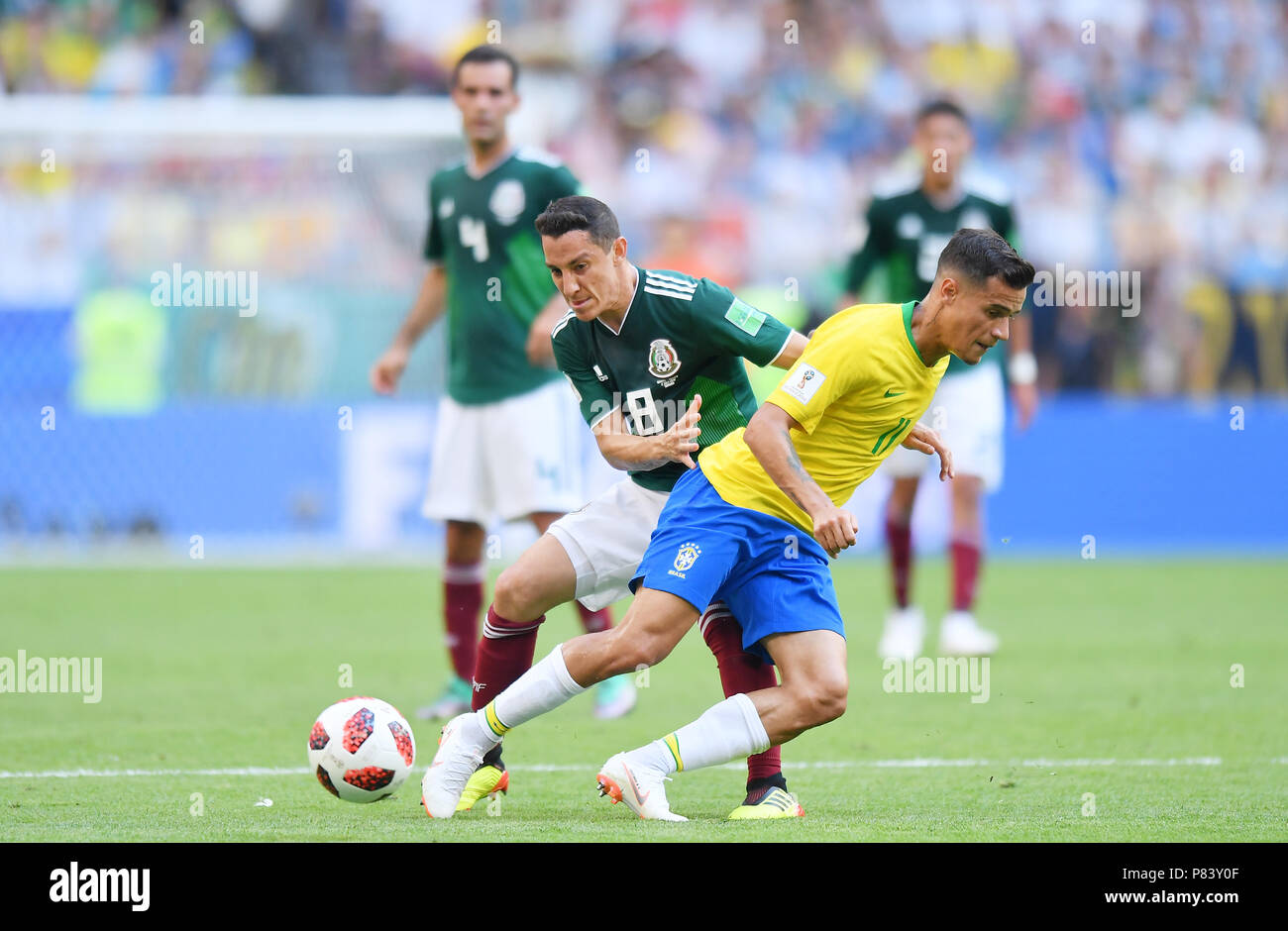 SAMARA, RUSSIA - JULY 02: Philippe Coutinho of Brazil competes with Andres Guardado of Mexico during the 2018 FIFA World Cup Russia Round of 16 match between Brazil and Mexico at Samara Arena on July 2, 2018 in Samara, Russia. (Photo by Lukasz Laskowski/PressFocus/MB Media) Stock Photo