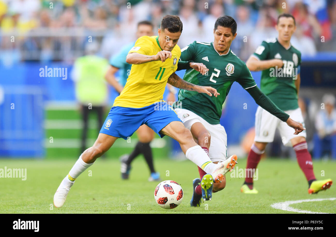 SAMARA, RUSSIA - JULY 02: Philippe Coutinho of Brazil competes with Hugo Ayala of Mexico during the 2018 FIFA World Cup Russia Round of 16 match between Brazil and Mexico at Samara Arena on July 2, 2018 in Samara, Russia. (Photo by Lukasz Laskowski/PressFocus/MB Media) Stock Photo