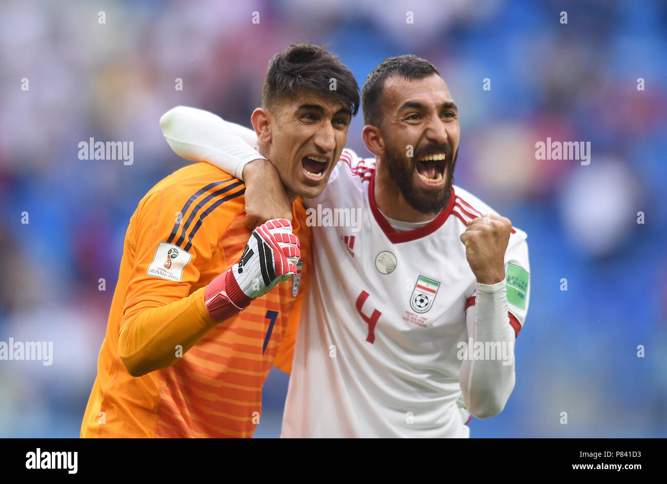 SAINT PETERSBURG, RUSSIA - JUNE 15: Ali Beiranvand and Roozbeh Cheshmi of IR Iran celebrate at full time during during the 2018 FIFA World Cup Russia group B match between Morocco and Iran at Saint Petersburg Stadium on June 15, 2018 in Saint Petersburg, Russia. (Photo by Lukasz Laskowski/PressFocus/MB Media) Stock Photo
