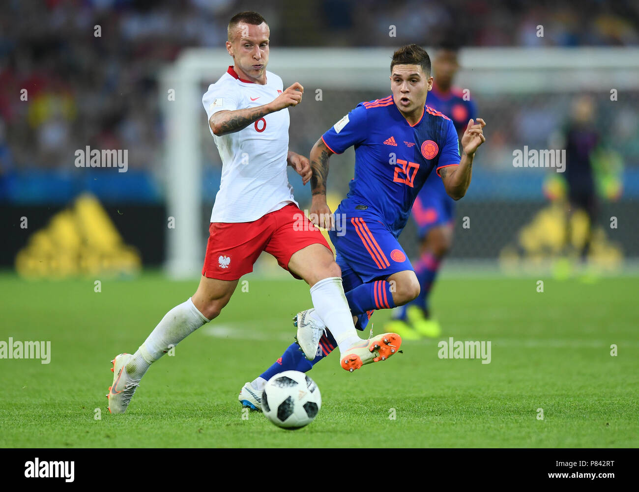 KAZAN, RUSSIA - JUNE 24: Juan Quintero of Colombia competes with Jacek Goralski of Poland during the 2018 FIFA World Cup Russia group H match between Poland and Colombia at Kazan Arena on June 24, 2018 in Kazan, Russia. (Photo by Lukasz Laskowski/PressFocus/MB Media) Stock Photo