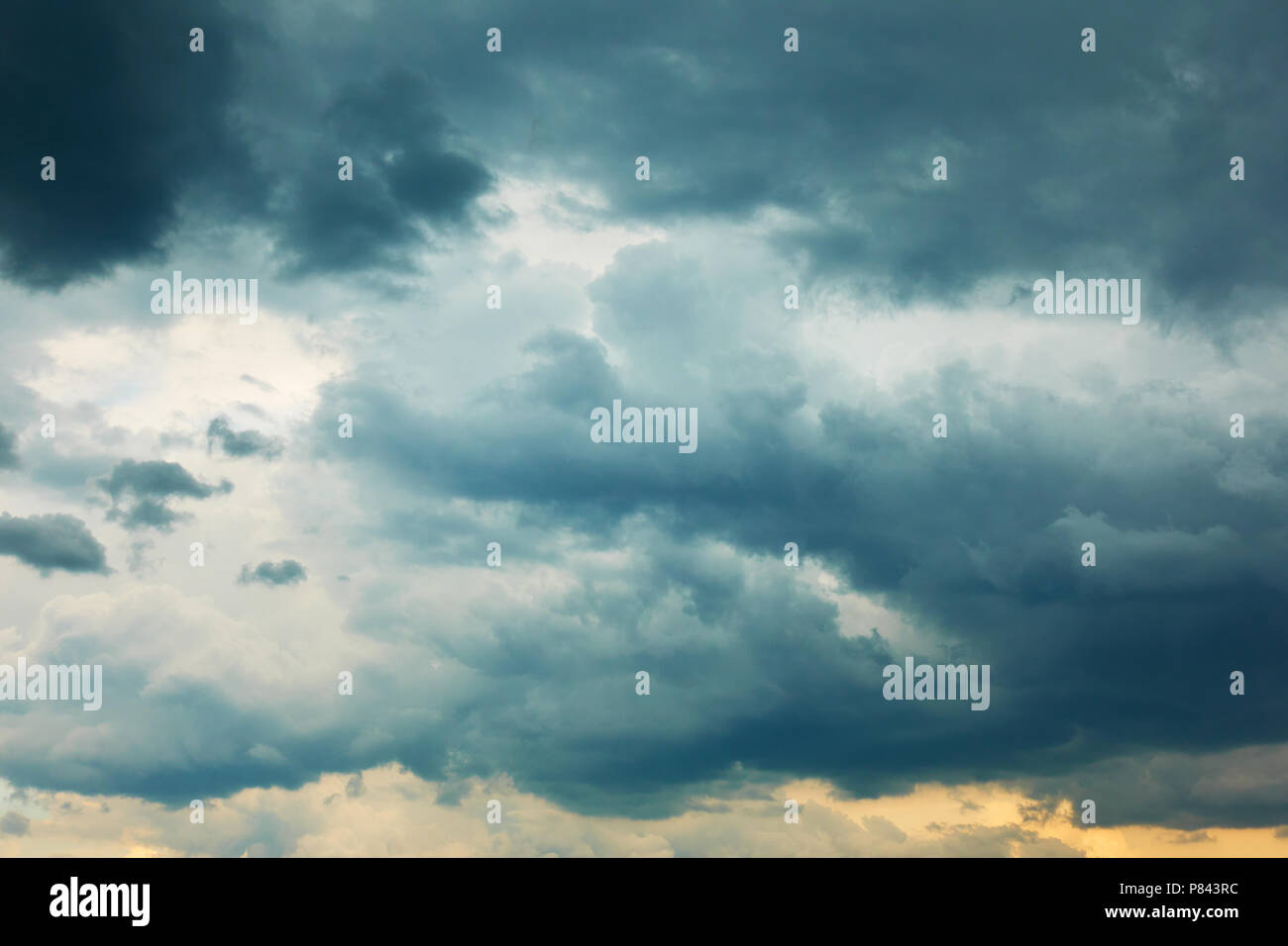 Dramatic stormy sky with heavy clouds, may be used as background Stock Photo