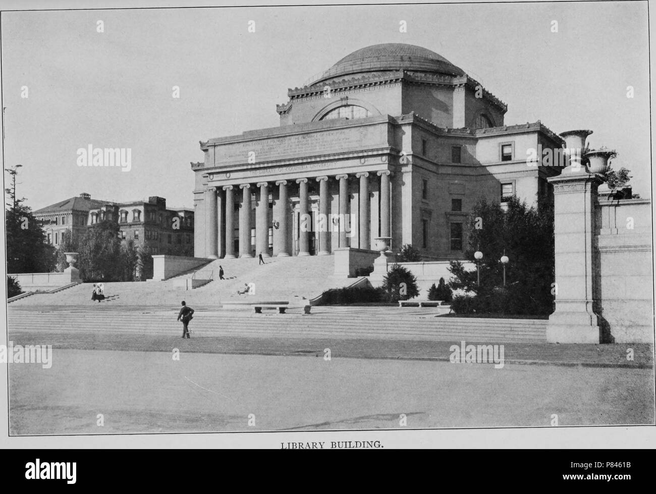 Black and white photograph of the eastern facade of the 1895 Low Memorial Library Building, a neoclassical structure designed by architect Charles Follen McKim, located at Columbia University in New York City, 1903. Courtesy Internet Archive. () Stock Photo