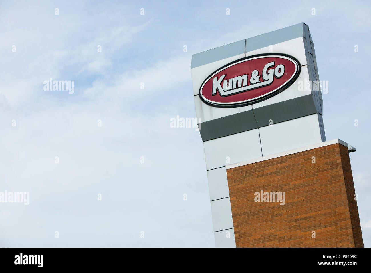 A logo sign outside of the headquarters of Kum & Go in West Des Moines
