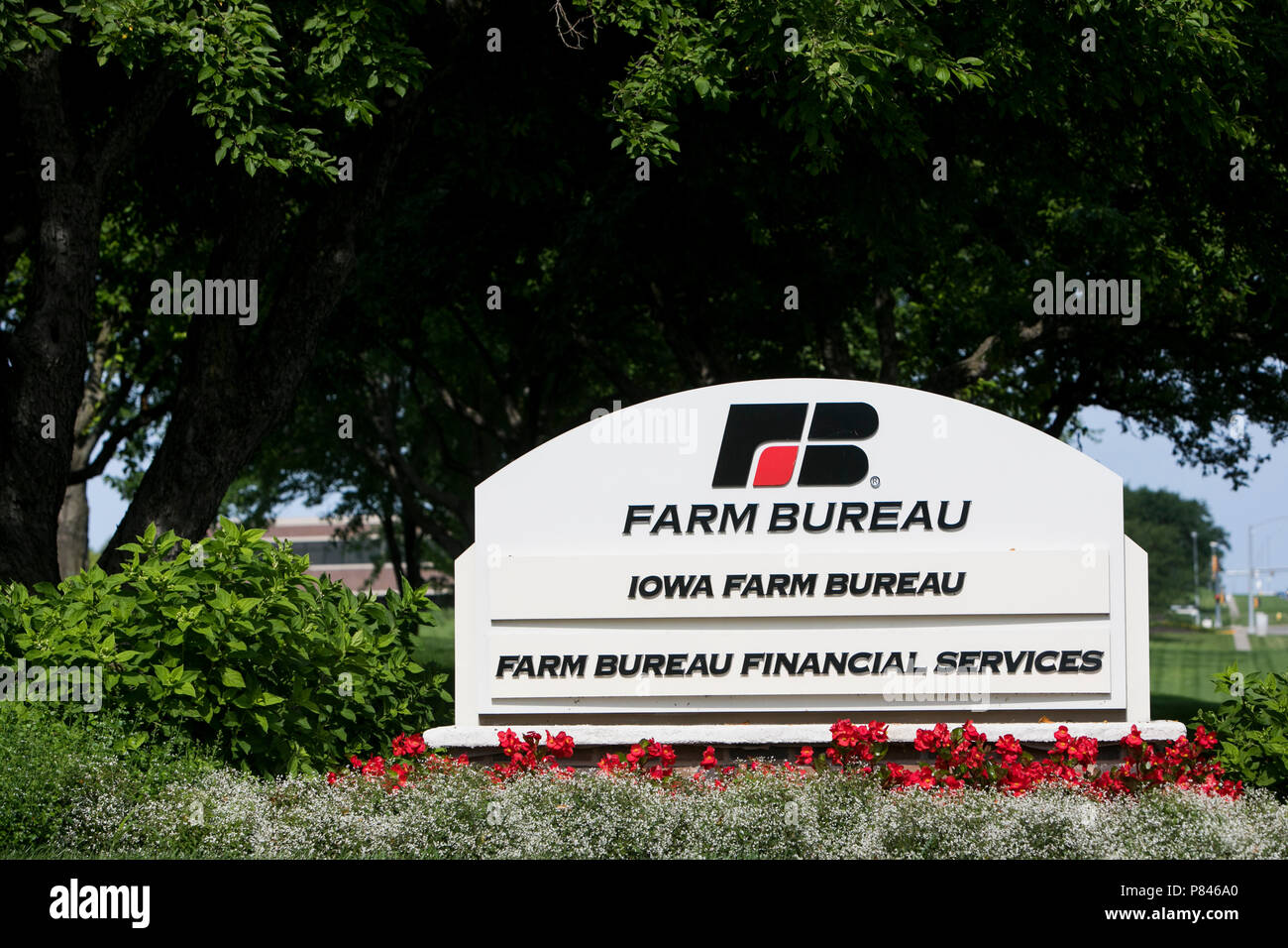 A logo sign outside of the headquarters of the Iowa Farm Bureau