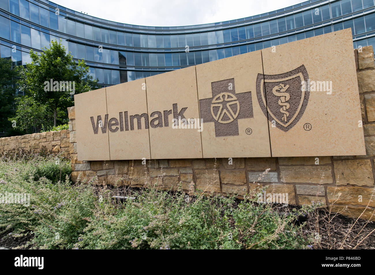 A logo sign outside of the headquarters of Wellmark Blue Cross and Blue Shield of Iowa in Des Moines, Iowa, on June 30, 2018. Stock Photo