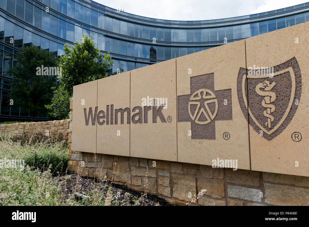 A logo sign outside of the headquarters of Wellmark Blue Cross and Blue Shield of Iowa in Des Moines, Iowa, on June 30, 2018. Stock Photo