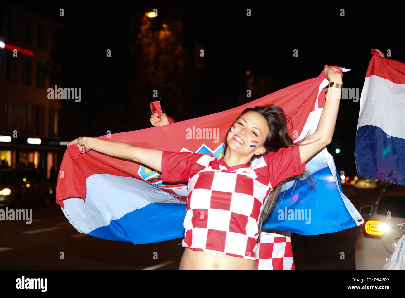 Munich, Germany. 07th July, 2018. Croatian girl cheering up after the won match. Fans of Russia and Crotia watched the quarter finals of the FIFA world cup between Russia and Crotia in Munich. Crotia won the match with a 6-5 in the penealties. Credit: Alexander Pohl/Pacific Press/Alamy Live News Stock Photo