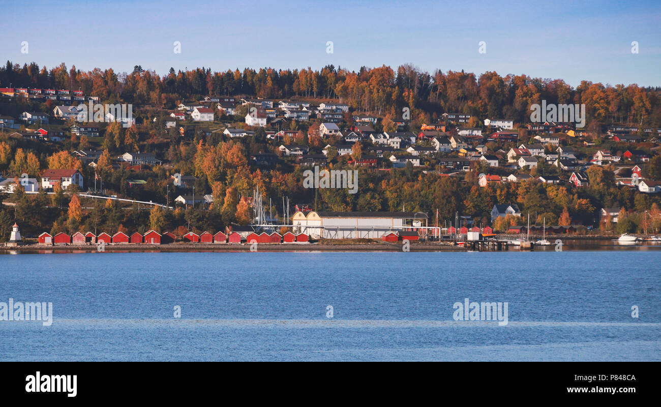 Norwegian coastal landscape with colorful wooden houses in autumn. Stenkjer, Trondheim region Stock Photo