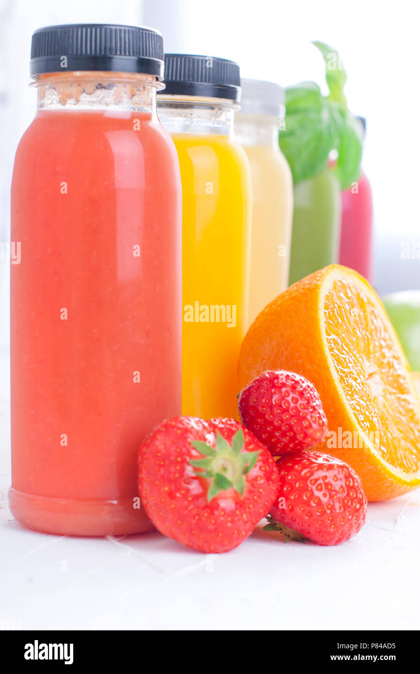 Green, Yellow, Orange and Red Smoothie in Glass Bottles Stock Photo - Image  of drink, diet: 161022426