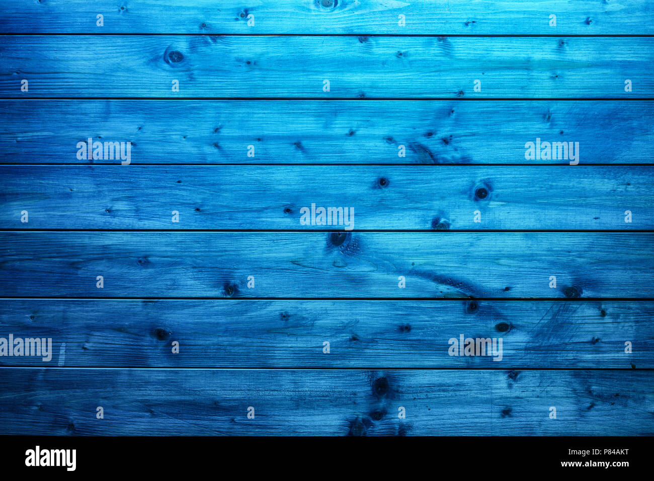 Top of view freshly painted blue wooden table. Stock Photo